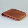 Slim leather bifold with hand-stitching open slots