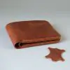 Slim leather bifold with hand-stitching open slots